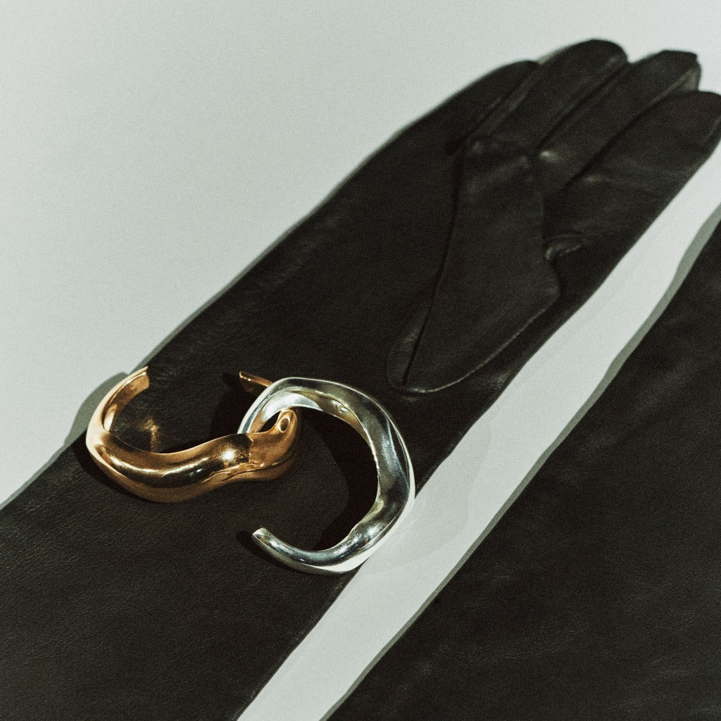 AGMES 0.925 sterling silver and 18k gold vermeil large Astrid sculpted cuff bracelets.