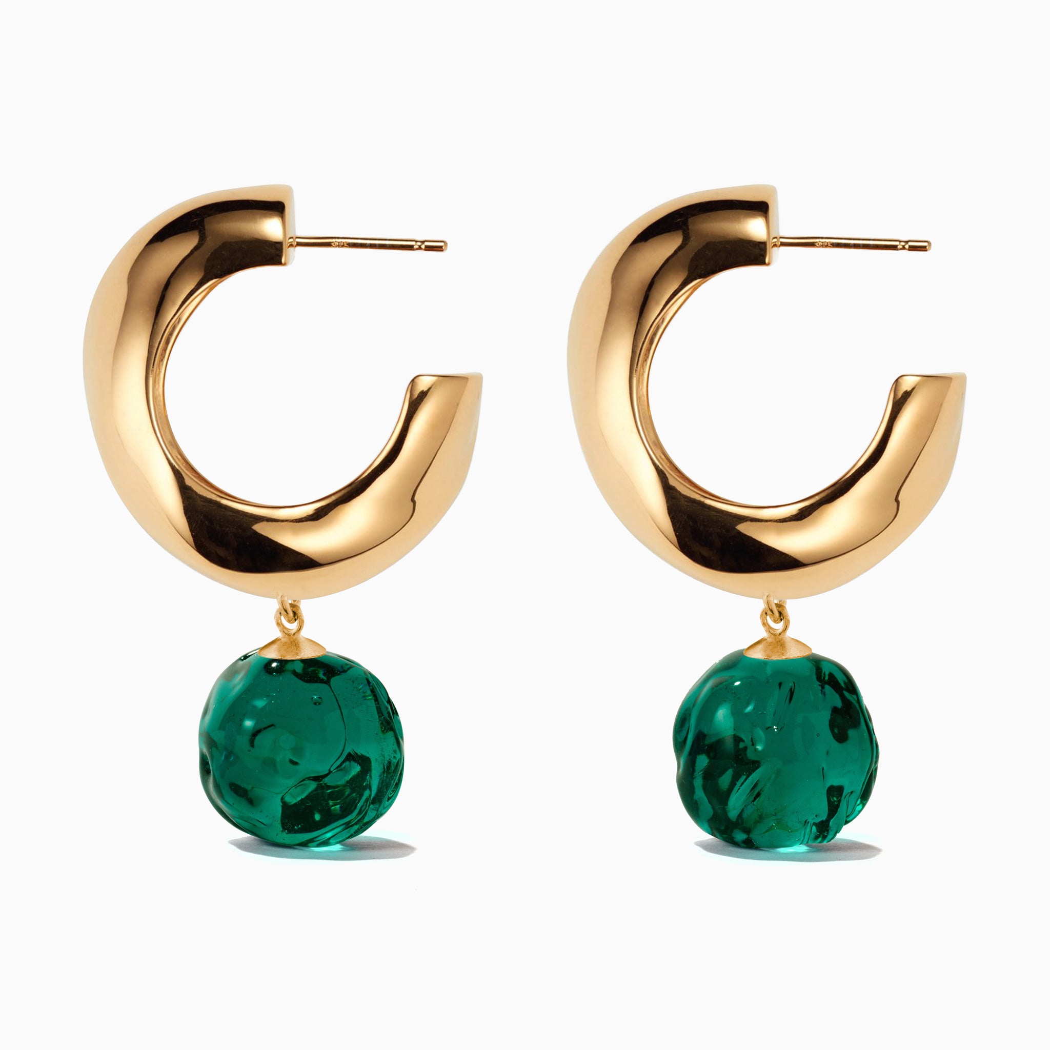 AGMES yellow gold vermeil medium Cleo hoop earrings with green glass bead drop on white background.