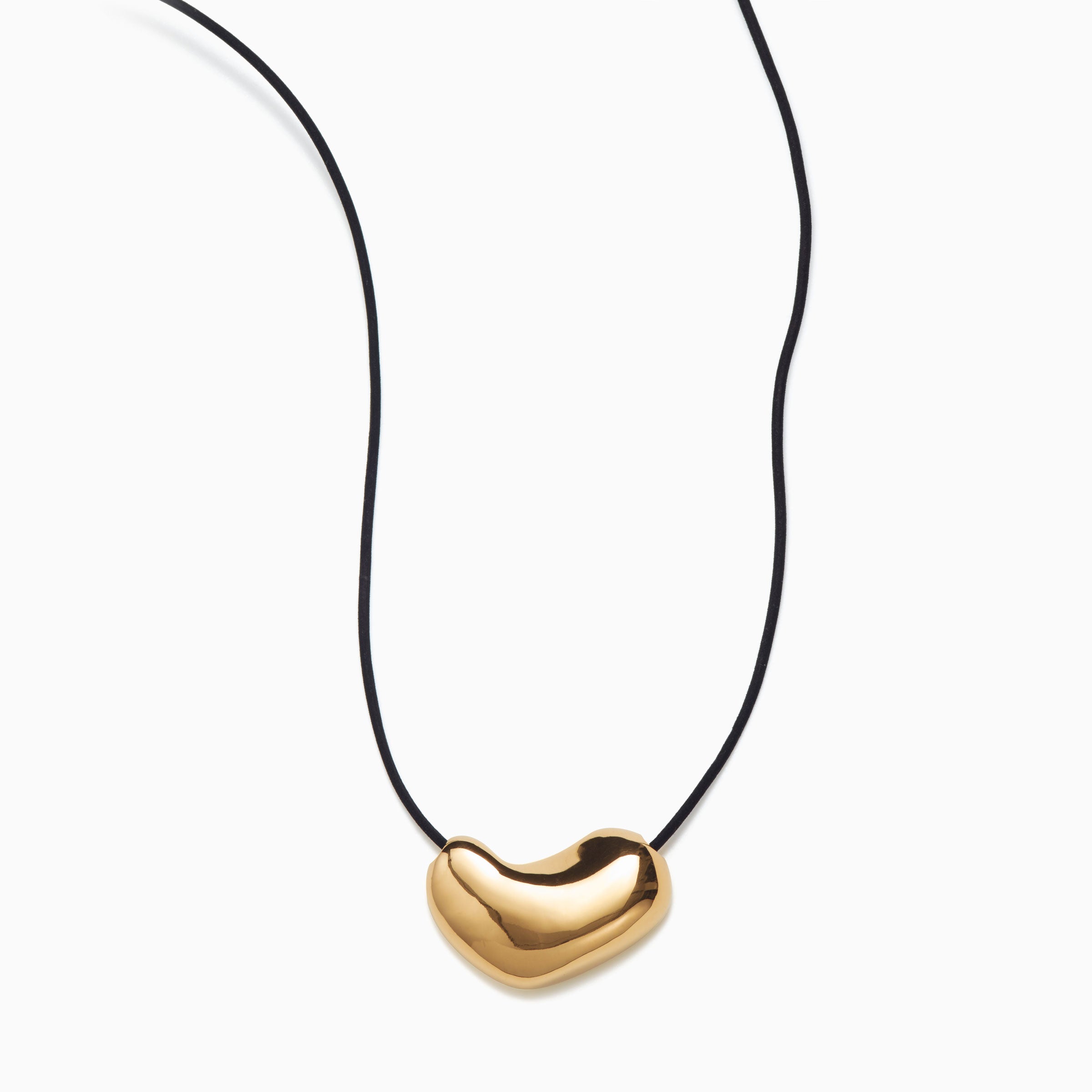 AGMES 18K Gold Vermeil Sculpted Heart Pendant on Black Suede cord.