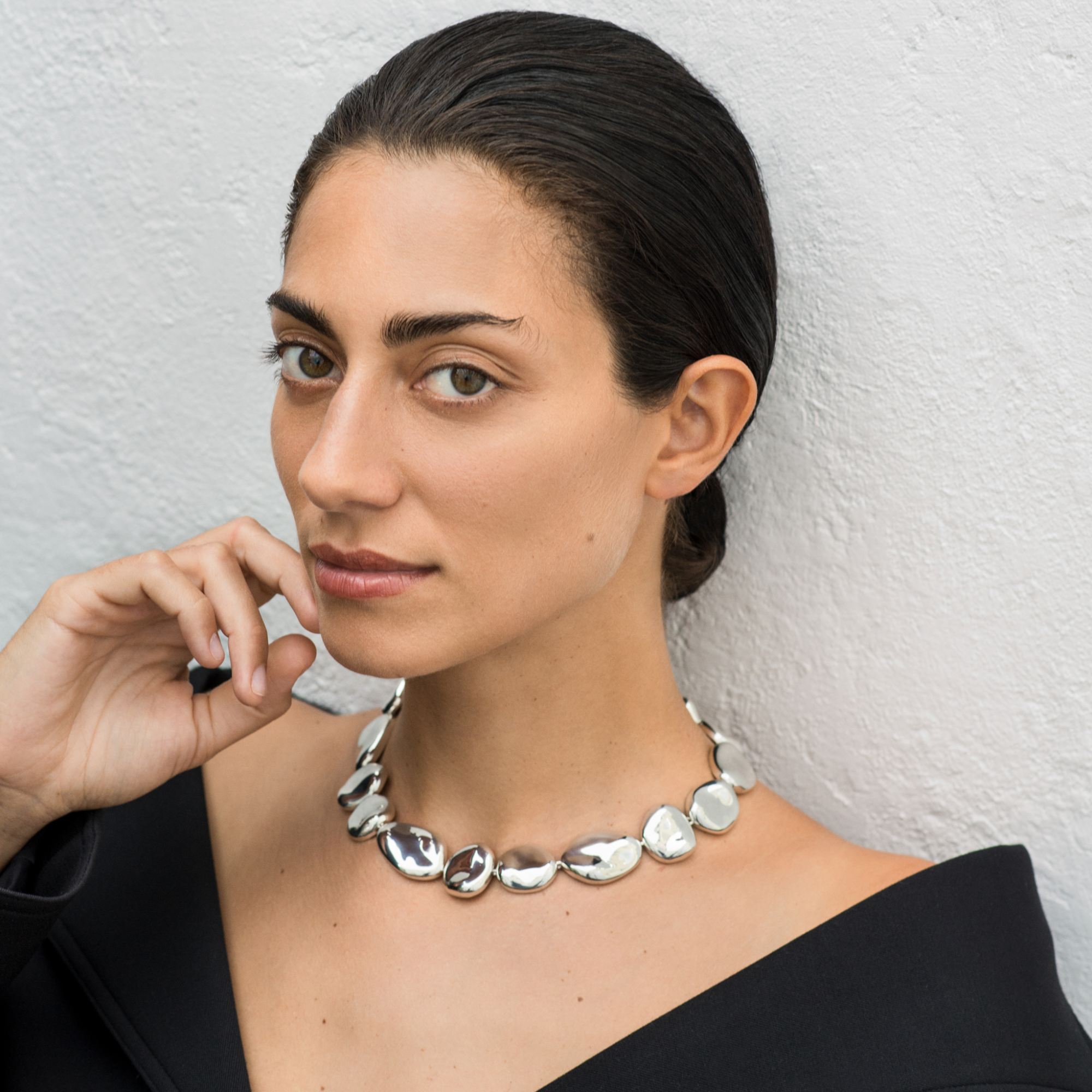 Woman wearing AGMES .925 Sterling Silver Conie sculpted round Necklace with T-Bar Clasp.