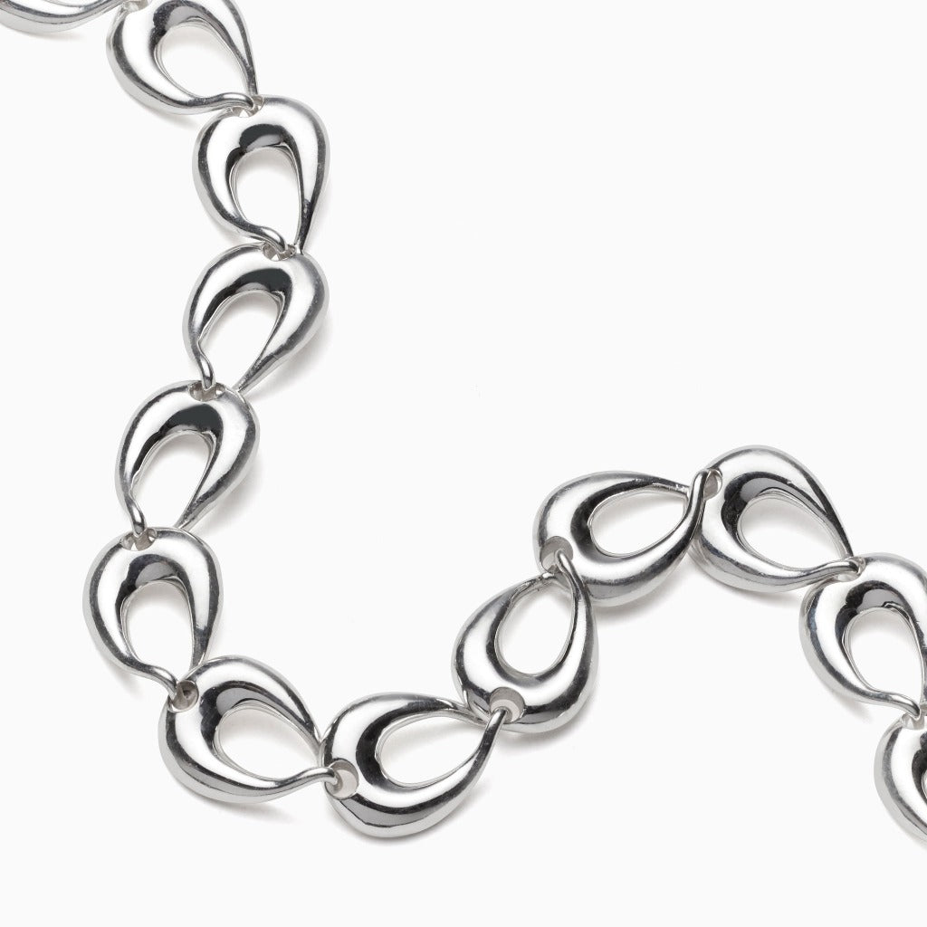 AGMES .925 sterling silver sculptural link Thin Tilda Necklace on white background.