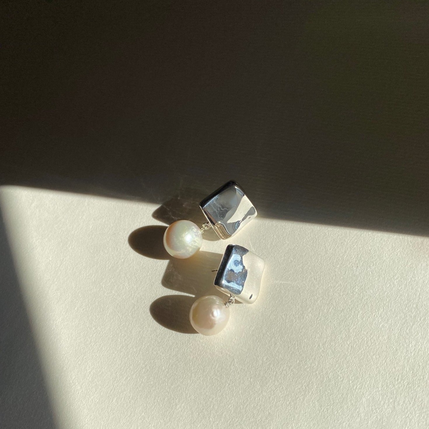 AGMES 0.925 sterling silver square shaped earrings with freshwater pearl drop.