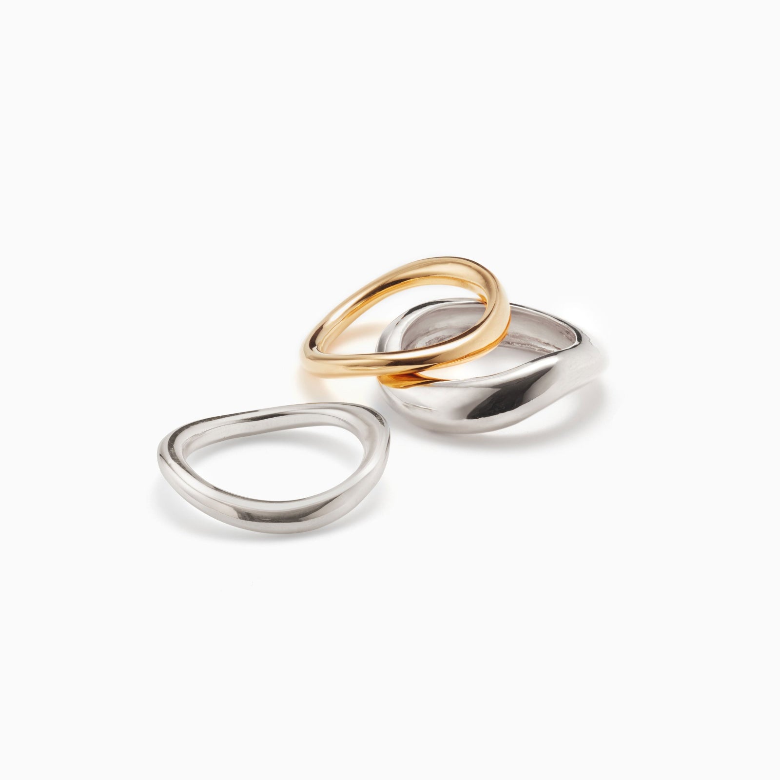 AGMES Astrid Ring Set III in .925 Sterling Silver, and 14k Solid Yellow Gold. Includes 2 medium, and 1 large Astrid Ring. 