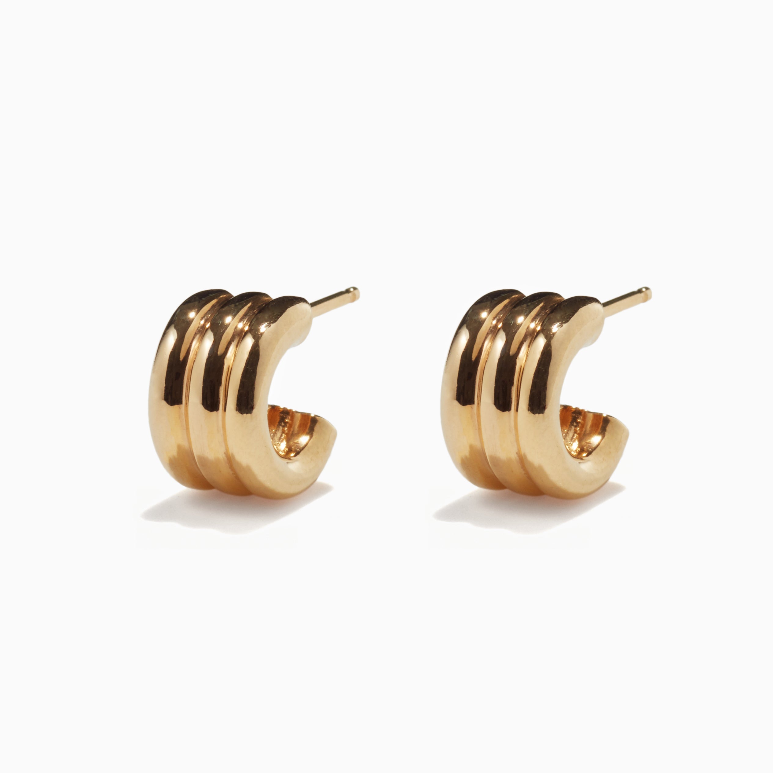 AGMES 18k gold vermeil triple ridged mini hoop earrings.