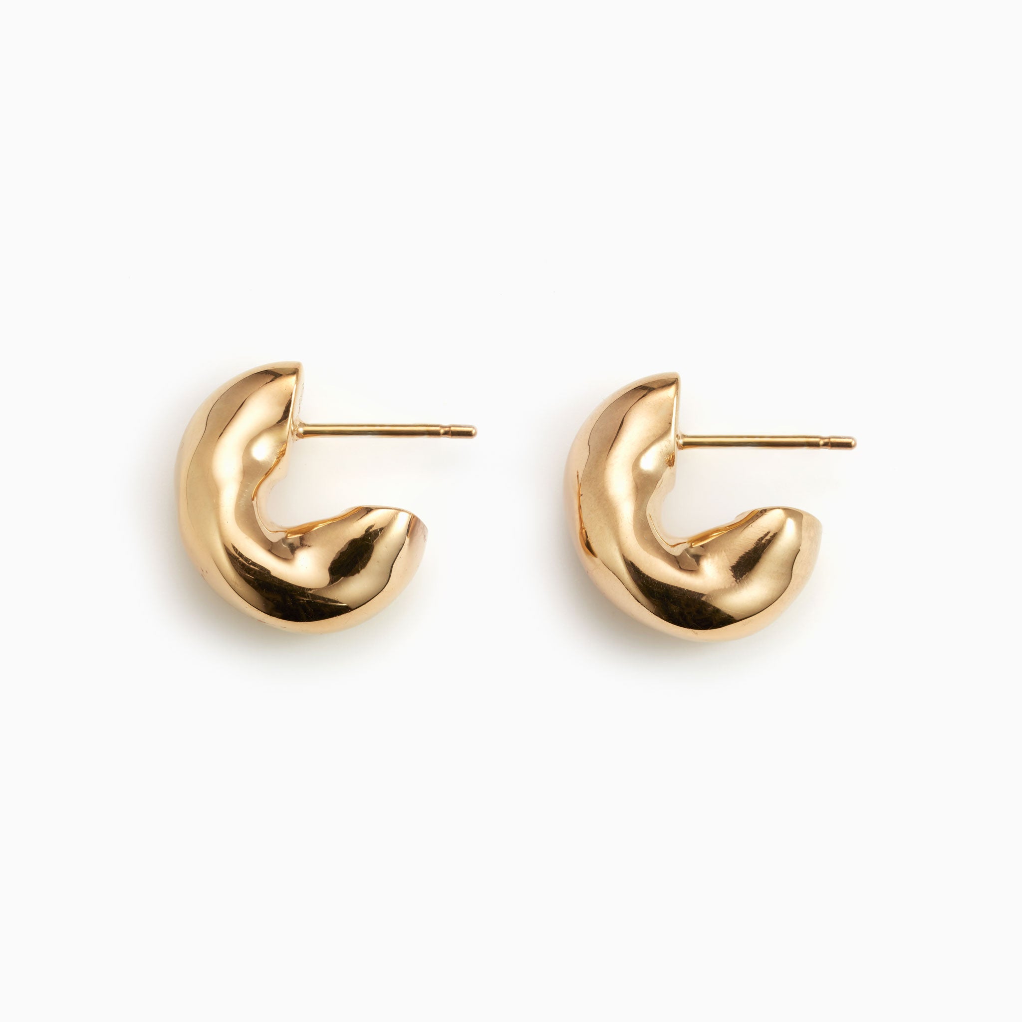 AGMES 18k gold vermeil thick hoop earrings.